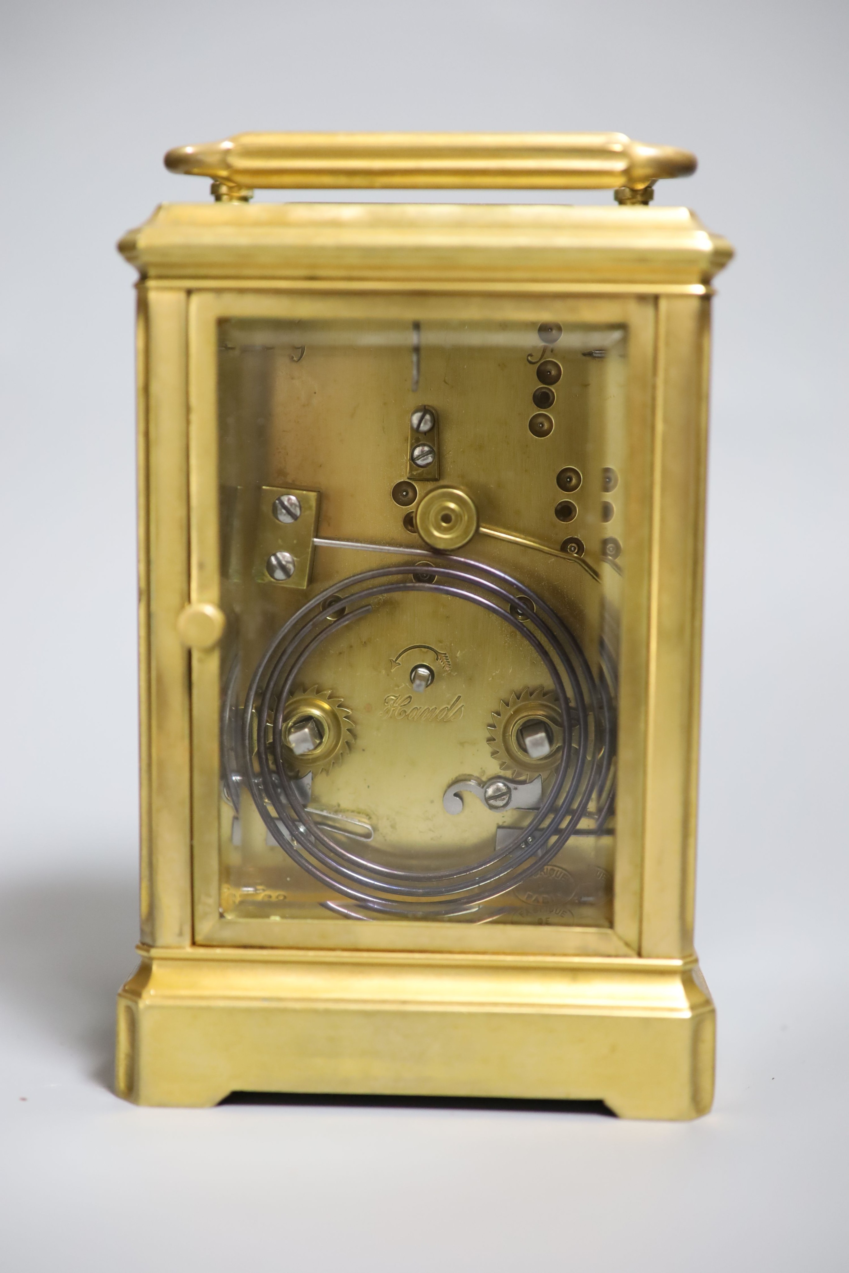 An early 20th century lacquered brass carriage clock, cased